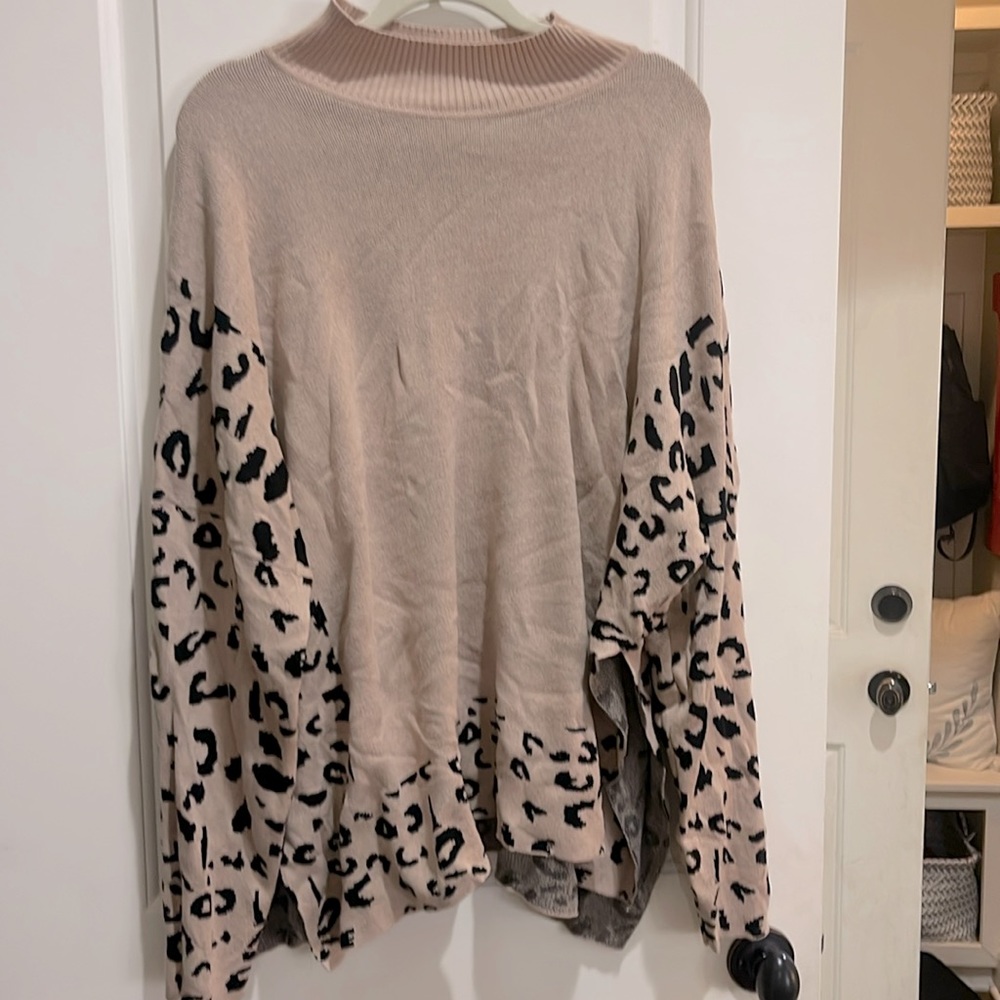 Boutique sweater with cheetah print in like new condition